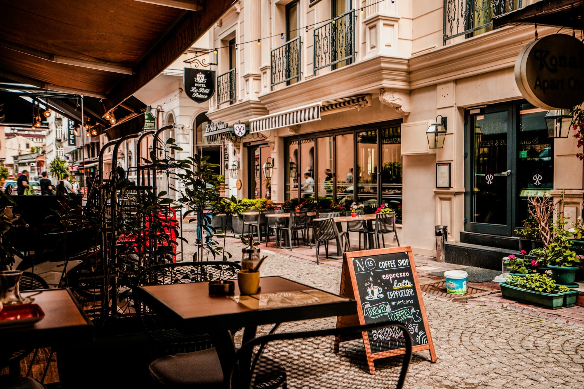 Inside a warm, lamplit coffee shop